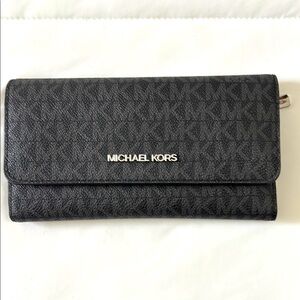Michael Kors Trifold wallet. Black and gray with silver accents.